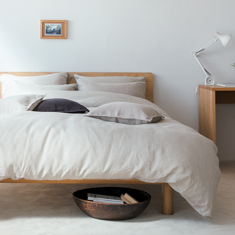 MUJI Bedding | Cotton & Linen, Women Asleep in an Off-White Comforter