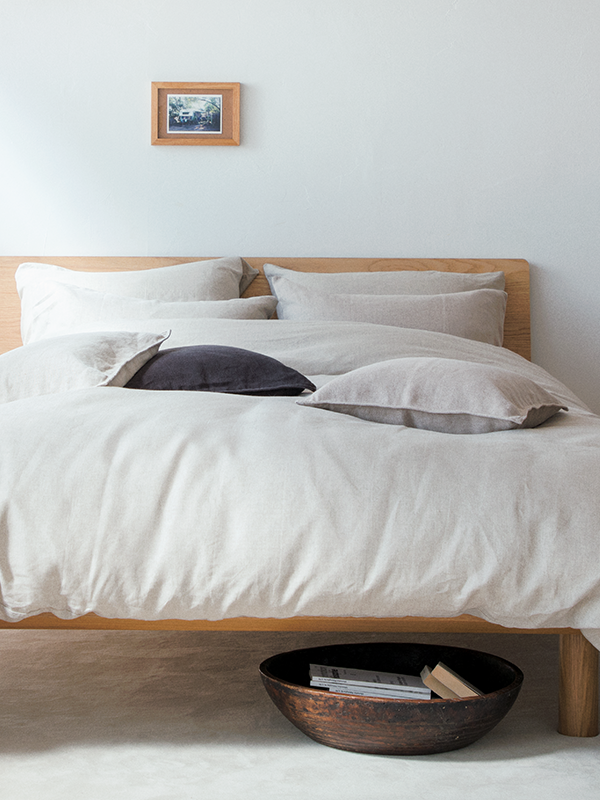 MUJI Bedding | Cotton & Linen, Women Asleep in an Off-White Comforter