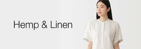 Woman wearing a white hemp & linen shirt with text on a white background