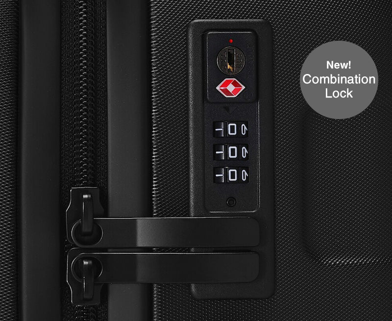 Black suitcase with a new combination lock feature on a dark textured background