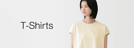 Woman wearing a beige t-shirt with 'T-Shirts' text on a light gray background