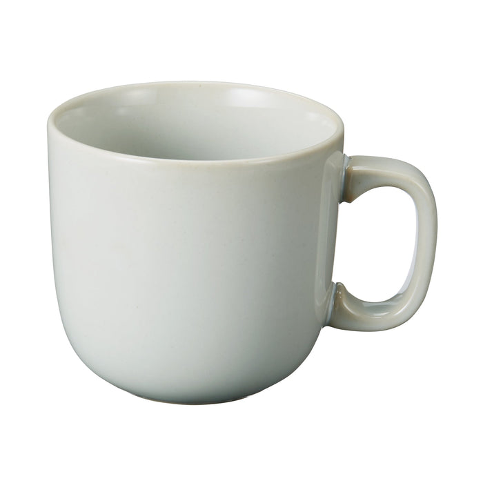 White transparent-glaze porcelain mug photographed by MUJI Canada.